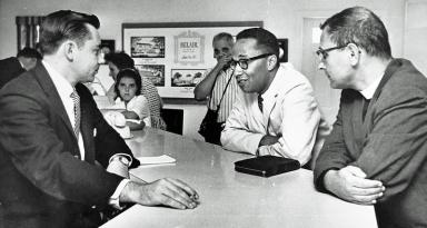 Karl D. Gregory (center) tries to buy a house in the Belair development, but sales clerks insisted that the Levitt homes could only be sold to white people in December 1962. (Source: Washington Star Photo collection, courtesy of DC Library)